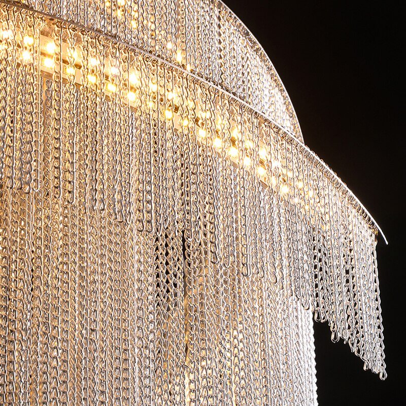 Lustre moderne à longue chaîne d'escalier de luxe